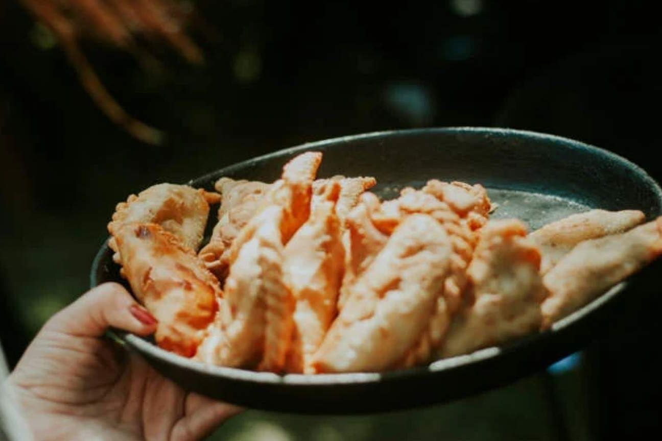 Justiceira haitiana envenena 40 membros de gangue com empanadas contaminadas em ato de vingança